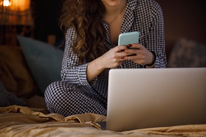 Woman in pajamas enjoying ethical porn online