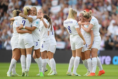 BRIGHTON, ENGLAND - JULY 11: Lauren Hemp of England celebrates with teammates Leah Williamson and El...