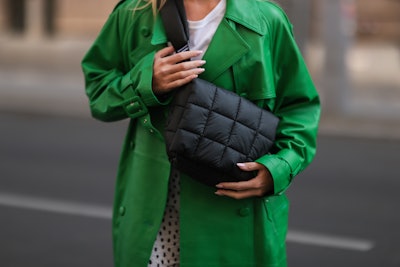 BERLIN, GERMANY - MAY 03: Sonia Lyson seen wearing a green leather coat from Ducie London, a beige w...