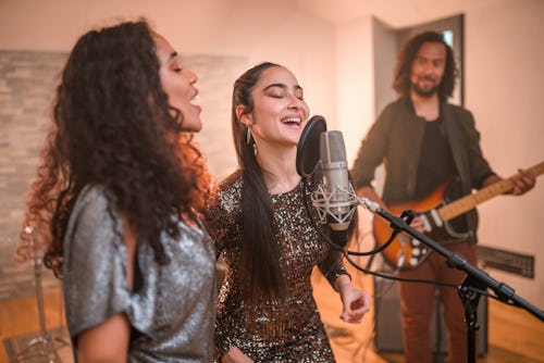 Young singers perform. This is the best career for leo zodiac signs.