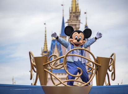 Mickey Mouse and friends take part in a parade at Walt Disney World ahead of the 50th anniversary.