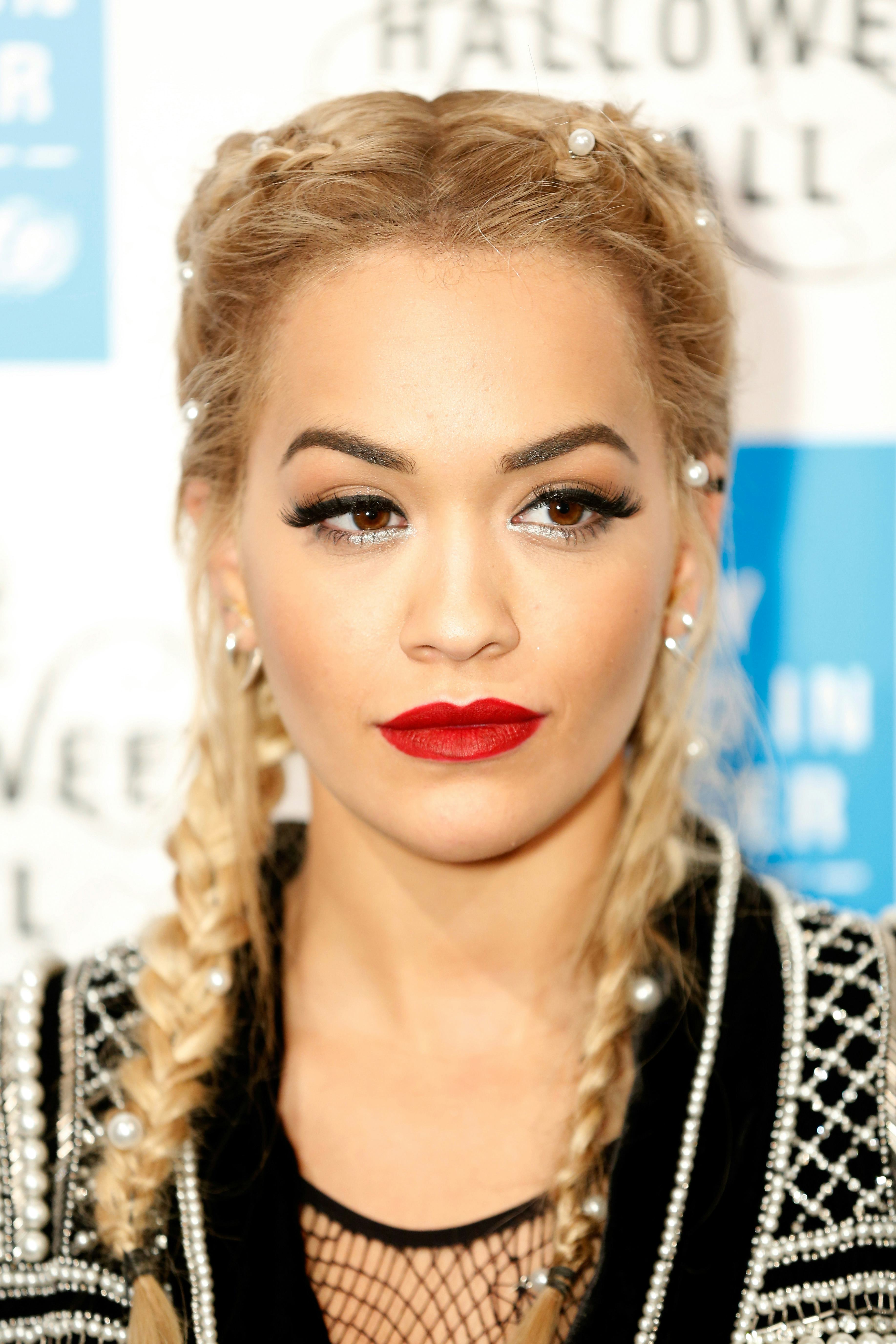 Rita Ora wears double French braid pigtails with pearl adornments at the UNICEF Halloween Ball at On&hellip;