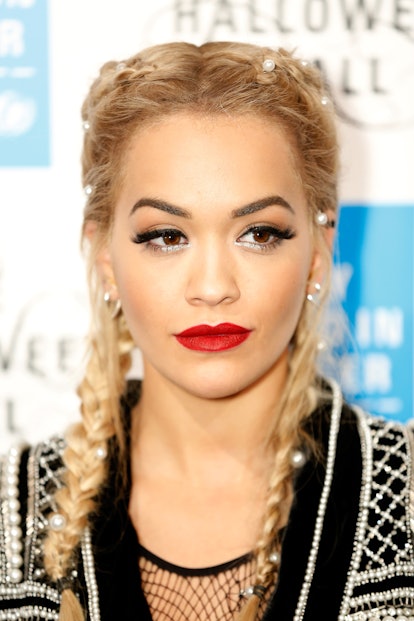 Rita Ora wears double French braid pigtails with pearl adornments at the UNICEF Halloween Ball at On...