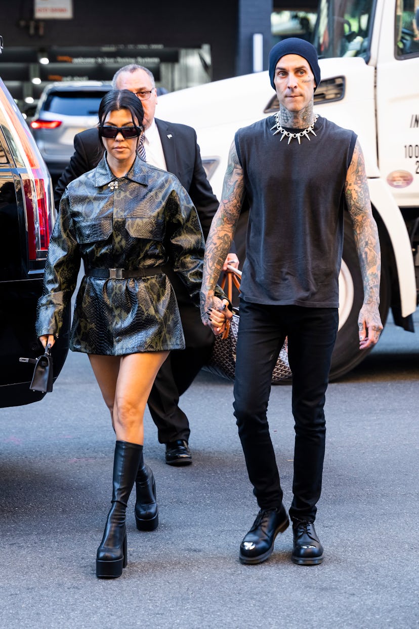 Travis Barker and Kourtney Kardashian wearing Naked Wolfe's Platform boots.