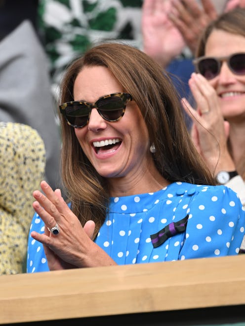 kate middleton wearing a blue polka dot dress and sunglasses at wimbledon on july 5