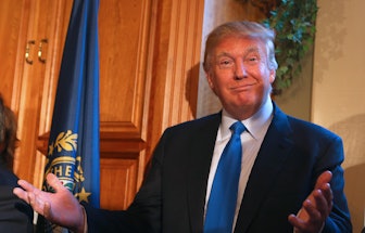 031915 Amherst, NH)Donald Trump, possible presidential candidate in 2016, smiles as he is introduced...