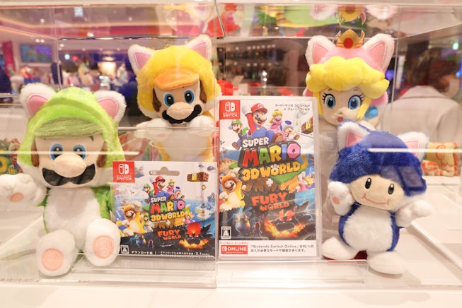 TOKYO, JAPAN - 2021/03/03: Super Mario 3D World + Bowser's Fury Nintendo video games on display insi...