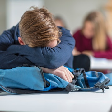 A teen sleeping at school. California just became the first state to mandate later starts to the sch...