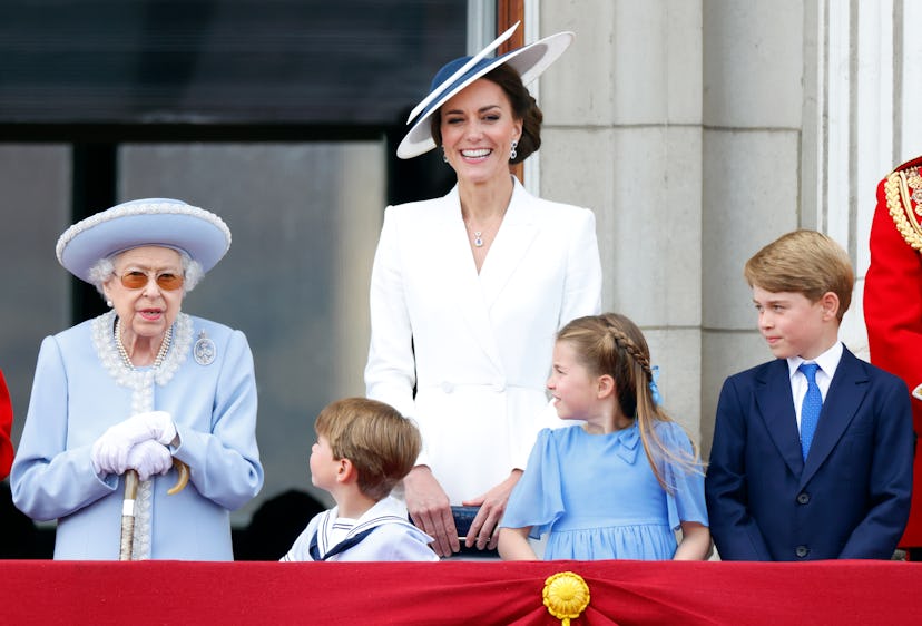 Princess Charlotte looks to the Queen.
