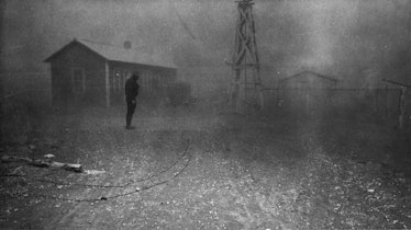 Dust storm. It was conditions of this sort which forced many farmers to abandon the area. Spring 193...
