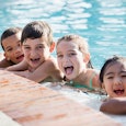 kids at the community pool in the summer