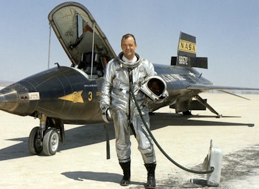Photograph of NASA research pilot Bill Dana standing next to the the North American X-15, a hyperson...