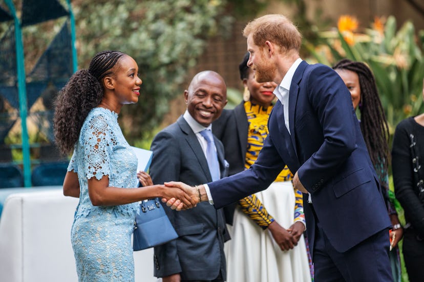 Britain's Prince Harry, Duke of Sussex(R) arrives at the British High Commissioner residency in Joha...