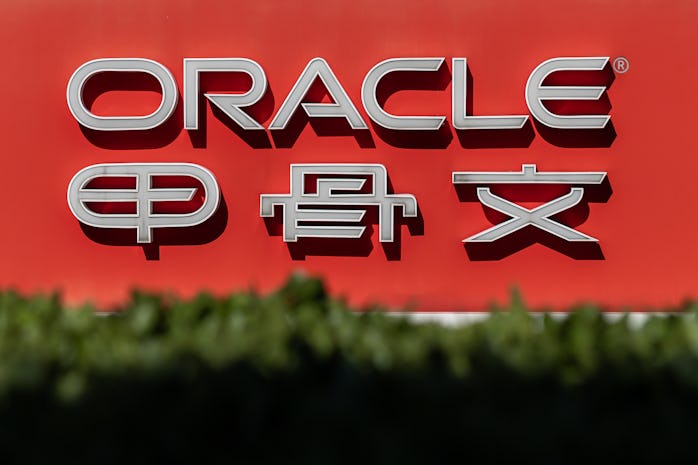 Oracle company signage is seen in front of the US-based technology company's office building in Beij...