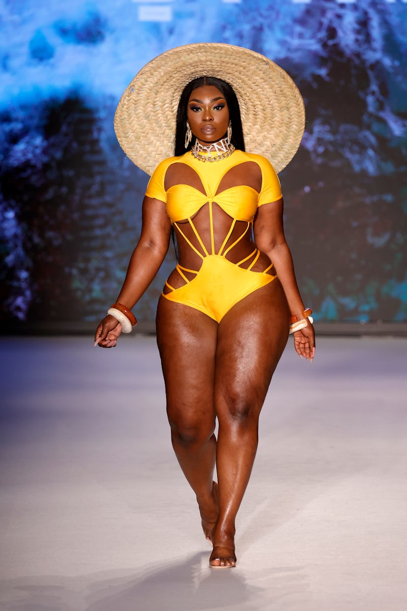 MIAMI BEACH, FLORIDA - JULY 17: A model walks the runway for Models Of Colors Matters Presents BFyne...