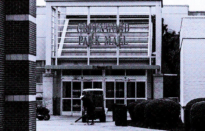 GREENWOOD, IN - JULY 18: A mall employee works outside of the food court entrance to Greenwood Park ...