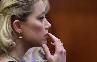 Actor Amber Heard waits before the jury said that they believe she defamed ex-husband Johnny Depp wh...