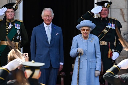 The Queen and Prince Charles attending a royal event. 