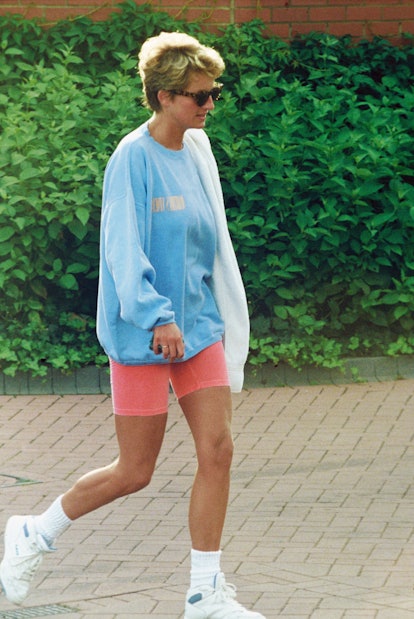 LONDON, ENGLAND - AUGUST 24: Diana, Princess of Wales, wearing a pale blue sweatshirt, pink cycling ...