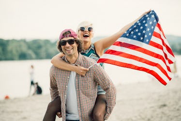 A couple dress the same of 4th of July with matching clothes.