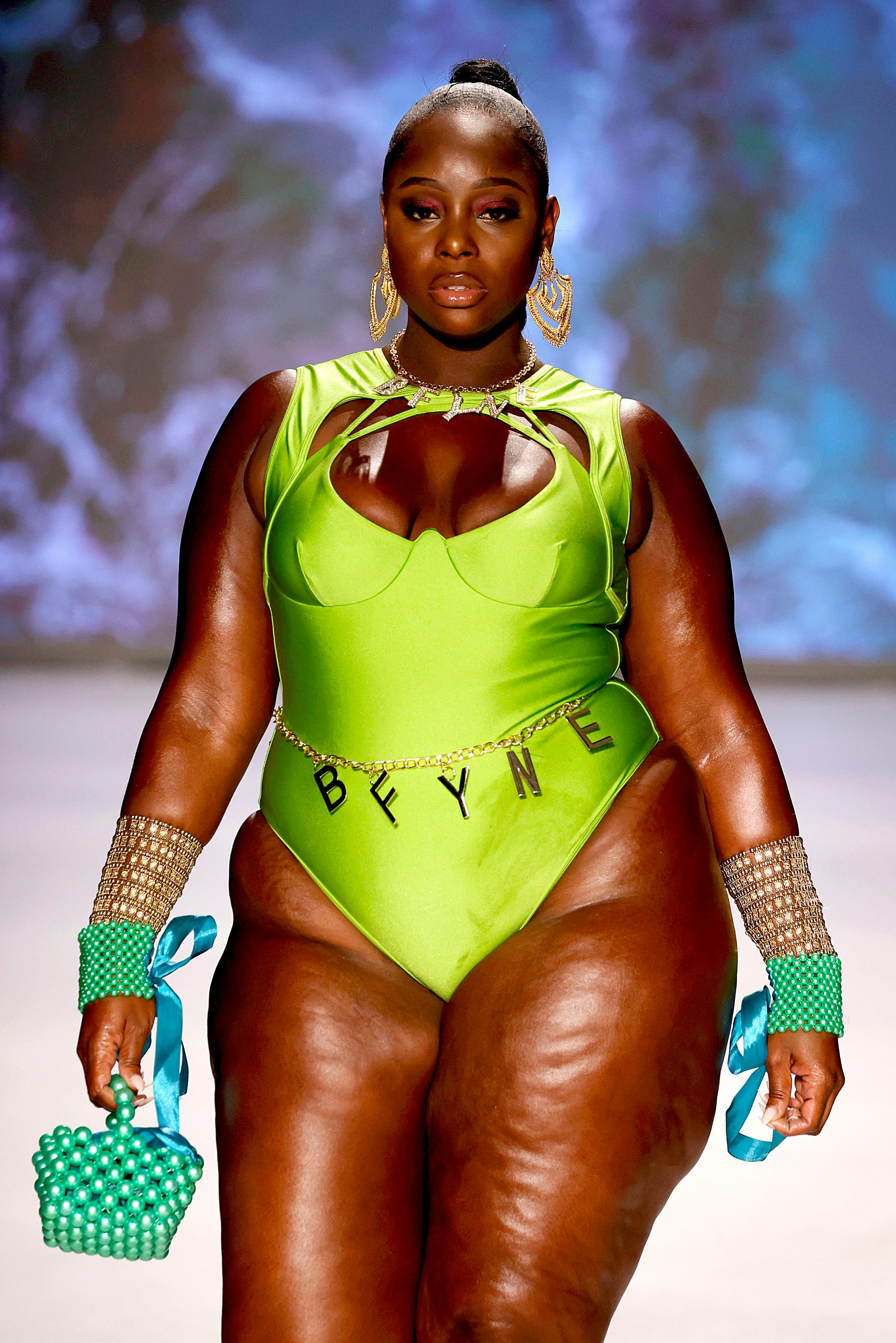 MIAMI BEACH, FLORIDA - JULY 17: A model walks the runway for Models Of Colors Matters Presents BFyne...