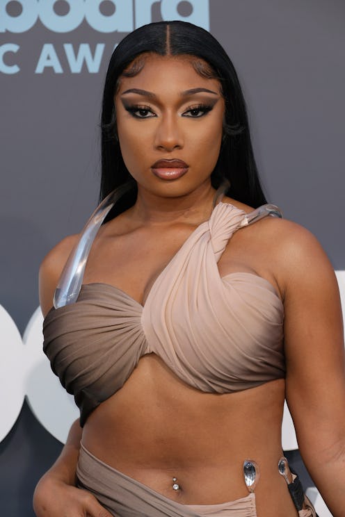 Megan Thee Stallion wore pink butterfly coffin nails with a 1990s, airbrushed twist.