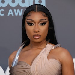 Megan Thee Stallion wore pink butterfly coffin nails with a 1990s, airbrushed twist.