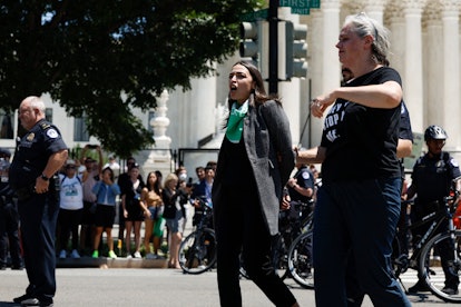 WASHINGTON, DC - JULY 19: Rep. Alexandria Ocasio-Cortez (D-NY) is detained by U.S. Capitol Police Of...
