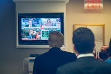 WASHINGTON, DC - NOVEMBER 20: President Donald J. Trump watches a television in the lower press offi...