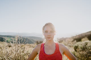 Young lady in a sports outfit feeling lonely due to perimenopause