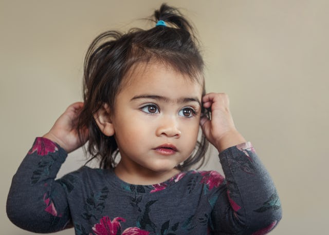 A mom is torn over whether or not to shave her daughter's unibrow after her husband disapproved of i...