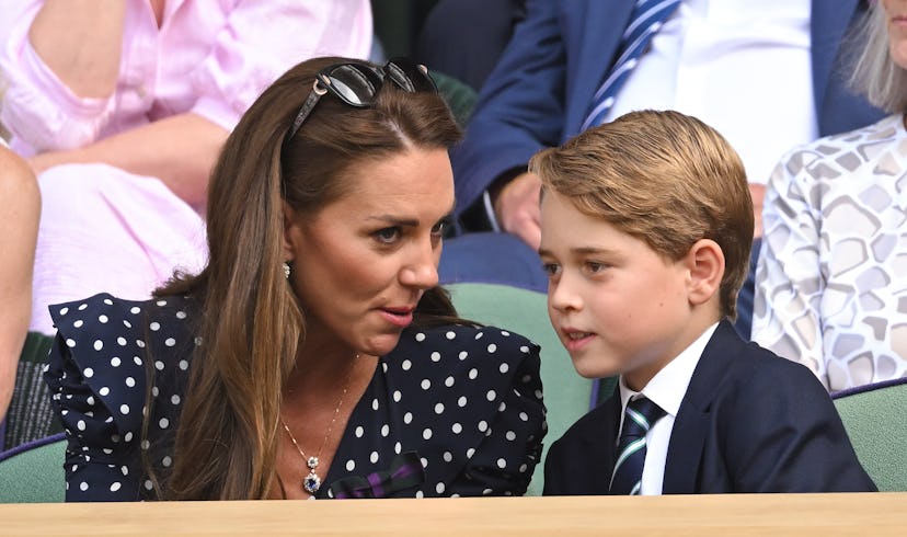 Kate Middleton and Prince George look to be sharing secrets.