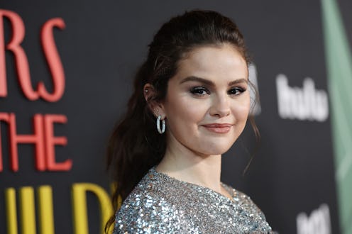 Selena Gomez attends Los Angeles Premiere Of "Only Murders In The Building" wearing silver sequin mi...