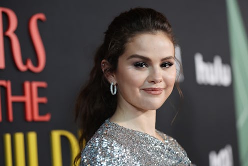 Selena Gomez attends Los Angeles Premiere Of "Only Murders In The Building" wearing silver sequin mi...