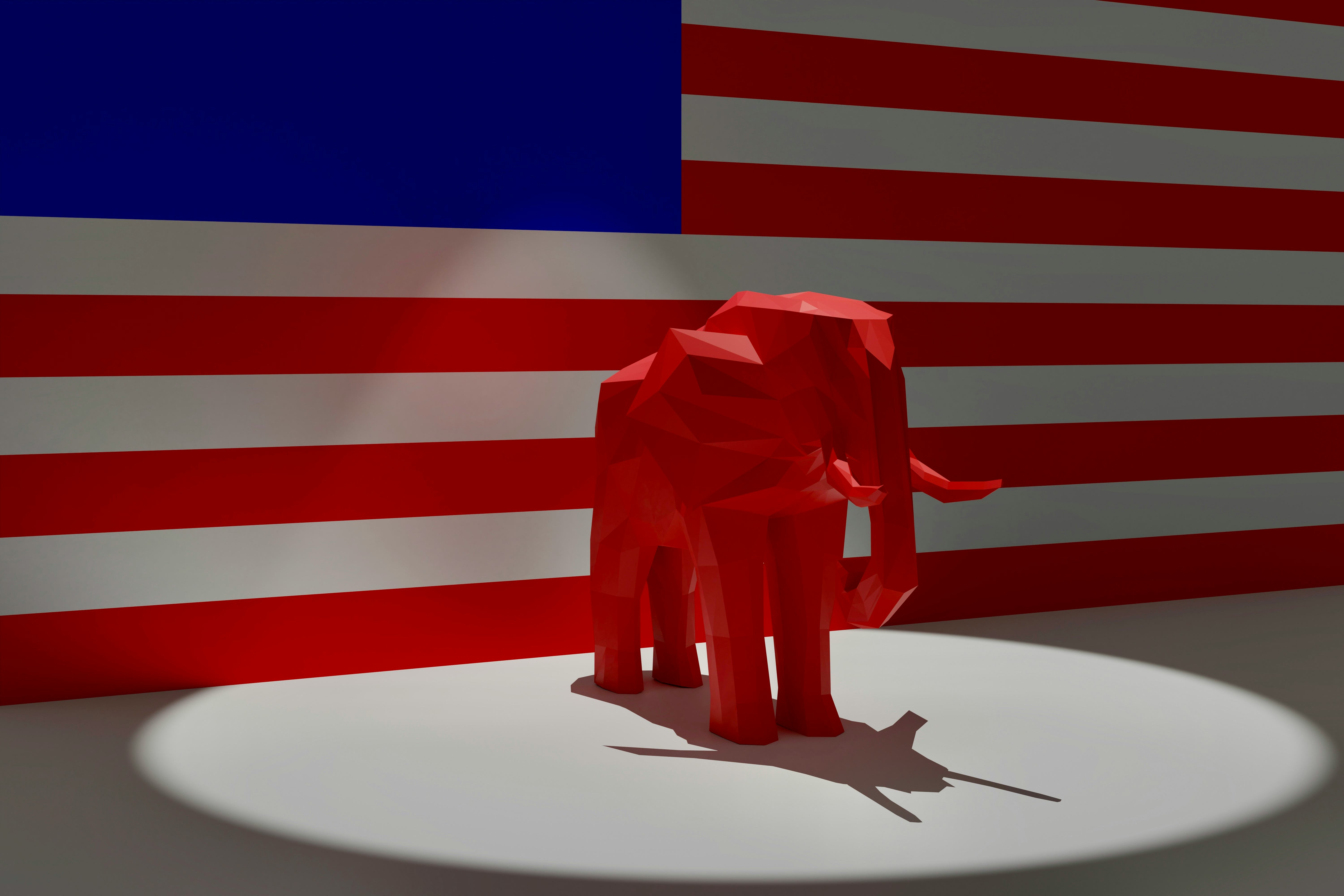 Rendering of a red elephant in a spotlight representing the Republican Political Party in front of t...