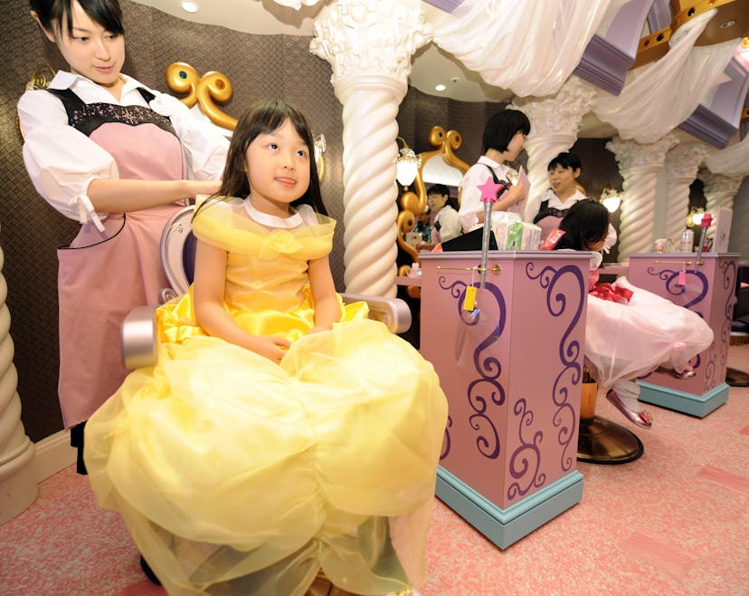 A girl gets a beauty treatment at salon "Bibbidi Bobbidi Boutique"at theTokyo Disneyland hotel.