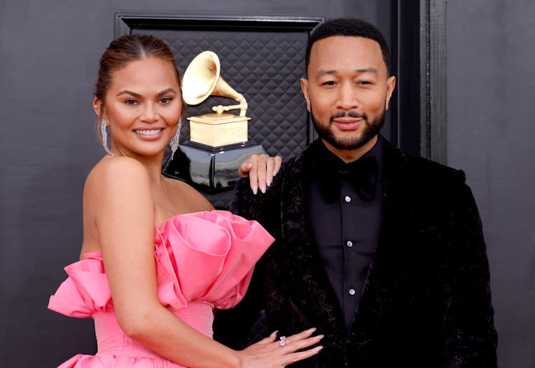 LAS VEGAS, NEVADA - APRIL 03: (L-R) Chrissy Teigen and John Legend attend the 64th Annual GRAMMY Awa...