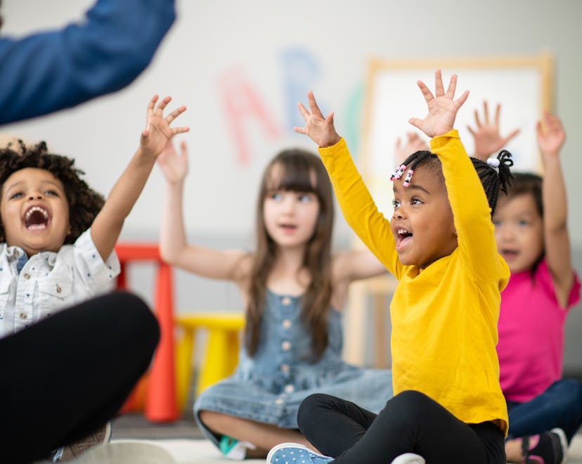 A super cute group of preschool children in an article about Montessori school tuitions.
