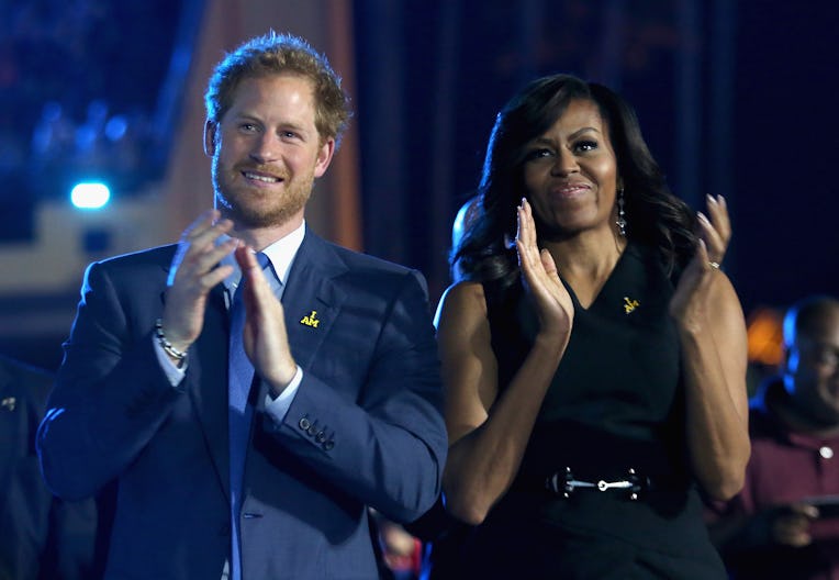 ORLANDO, FL - MAY 08:  Prince Harry and Michelle Obama cheer during the Opening Ceremony of the Invi...