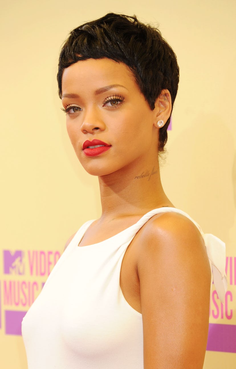 Rihanna wears her hair in a short pixie haircut at the 2012 MTV Video Music Awards in Los Angeles, C…