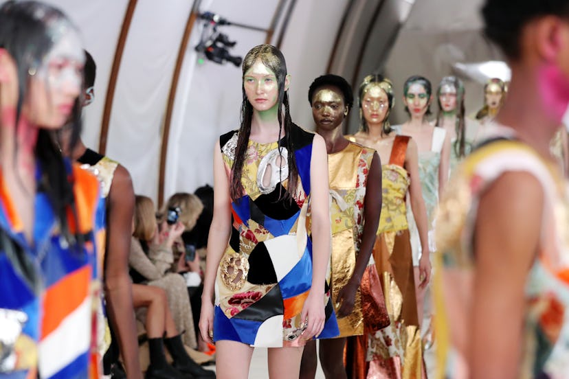 MILAN, ITALY - FEBRUARY 21: Models walk the runway at the Marni fashion show during Milan Fashion We...