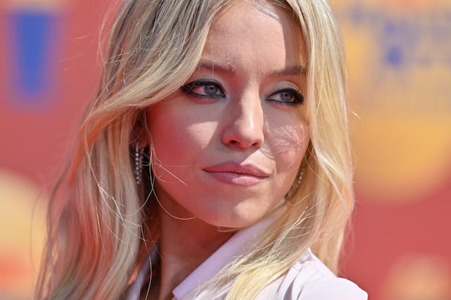 Sydney Sweeney says she wants to be a young mom. Here, she attends the 2022 MTV Movie & TV Awards at...