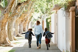 Mother running with son and daughter to school in the morning in an article about the best Instagram...