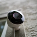Close-up of weatherproof outdoor Nest home surveillance camera from Google Inc installed in a smart ...