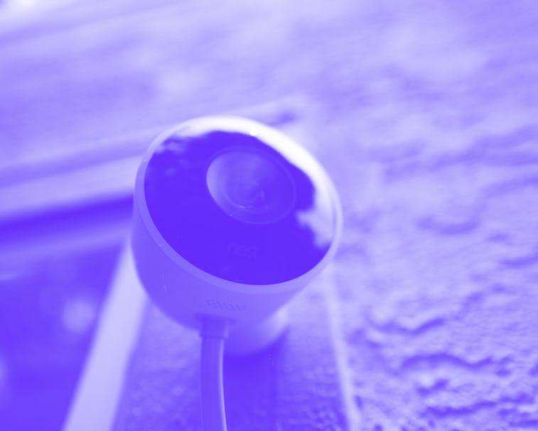 Close-up of weatherproof outdoor Nest home surveillance camera from Google Inc installed in a smart ...