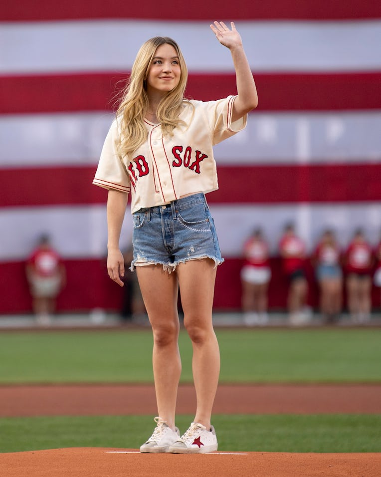 BOSTON, MA - JULY 22: Actress Sydney Sweeney is introduced before throwing a ceremonial first pitch ...