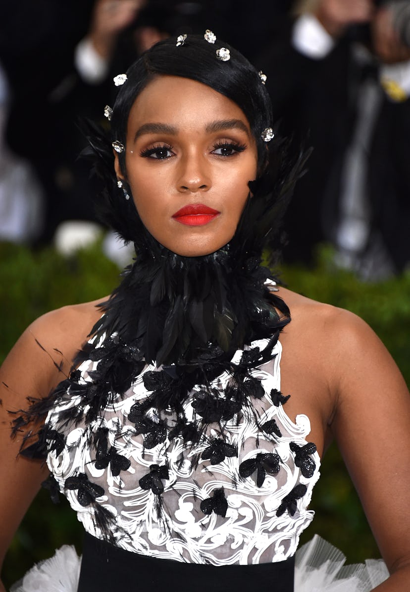 Janelle Monae wears decorative pins in her short natural hair at the “Rei Kawakubo/Comme des Garcons…