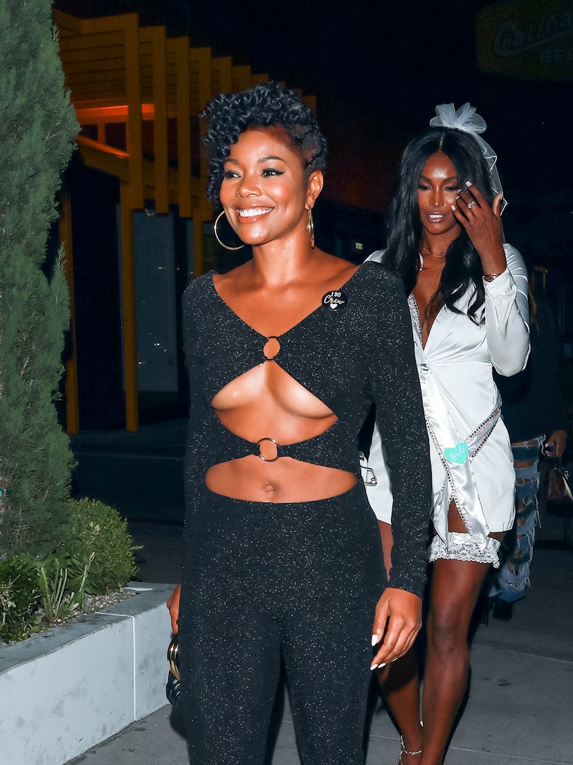 Gabrielle Union wearing her short natural curls in a mohawk with braids on the side in Los Angeles, ...