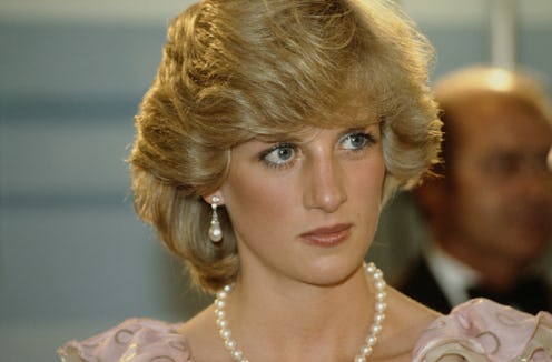 Princess Diana wearing pearl jewellery set and a Catherine Walker dress at a Gala concert hall in Me...
