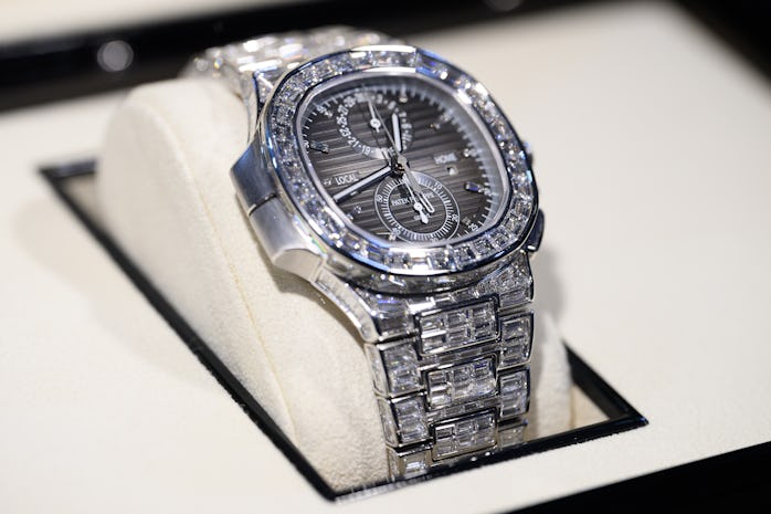 LONDON, ENGLAND - MARCH 19: A Patek Philippe Nautilus Travel Time Chronograph Full Diamond 5990/1400...